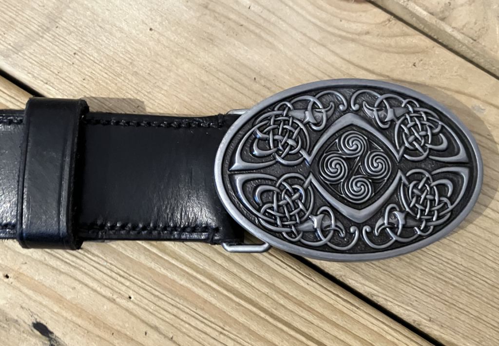 Black leather with custom buckle.